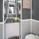 image displays the interior of a luxury portable restroom trailer